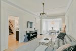 The East Side Living Room Offers Plenty of Comfy Seating - Perfect for Lounging, Chatting, and Enjoying Each Other`s Company